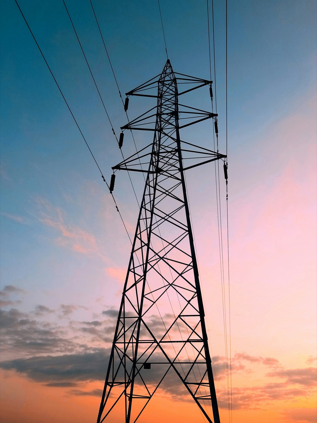 European energy transmission infrastructure at dusk